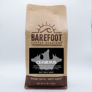 Brown Barefoot Coffee Roasters bag featuring the Cerberus logo and bold branding.