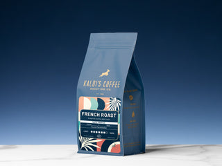 Kaldi's Coffee French Roast bag photographed upright against a clear blue sky.