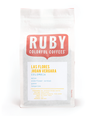 White coffee bag with Ruby Colorful Coffees logo and Las Flores Jhoan Vergara label