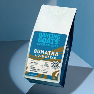 Sumatra Mutu Batak coffee bag highlighting wet hull process and single origin details on a white blue package