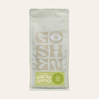Top of a white Colombia Demetrio Sanchez Gesha coffee bag with subtle branding