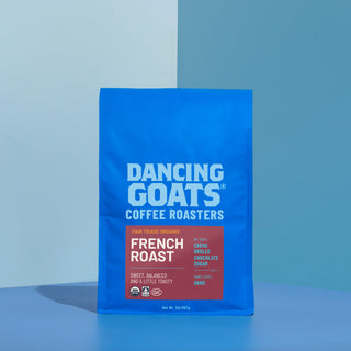 Blue Dancing Goats coffee bag with bold white Dancing Goats logo and coffee roasters branding