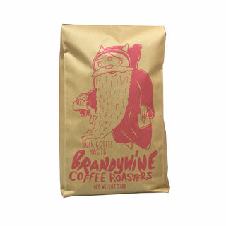 Brown kraft bulk coffee bag with pink illustrated bearded figure and branding