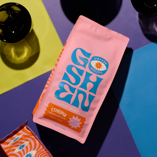 Ethiopia Yebesele Natural whole bean coffee bag in pink with Goshen Coffee Roasters logo.