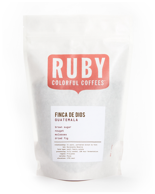 White coffee bag with Ruby logo and Finca De Dios Guatemala label