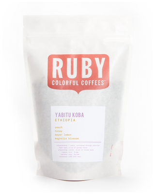 Front of a white Ruby coffee bag with a large red Ruby logo and the Ethiopia Yabitu Koba label.