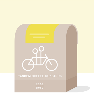 Abstract illustration of a beige coffee bag against a bright yellow background with Tandem Coffee Roasters branding.