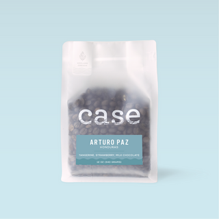 Case Coffee Honduras Arturo Paz bag with transparent lower section showing beans and a teal Arturo Paz label