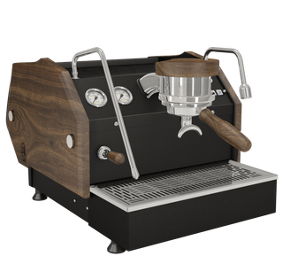 La Marzocco GS3 espresso machine with white front panel wood accents and visible gauges