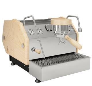 Close up of La Marzocco GS3 with wooden top and side panels highlighting its metal controls