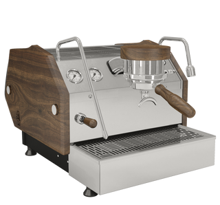 GS3 espresso machine with wooden side panels shown from a close crop focusing on gauges and portafilter