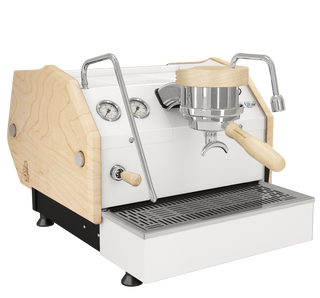 La Marzocco GS3 espresso machine with white body wood trim and stainless steel components including drip tray