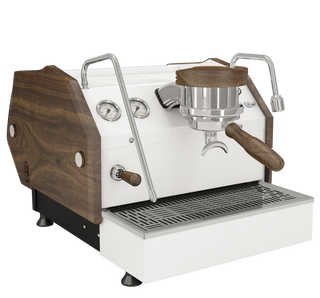 Close view of a La Marzocco GS3 espresso machine with wood side panels and front gauges.