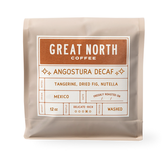 Great North Coffee Angostura Decaf bag label showing Chiapas Mexico origin and tasting notes Tangerine Dried Fig Nutella