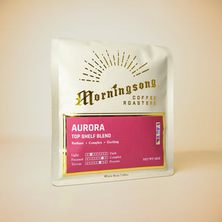 Aurora Top Shelf Blend coffee bag with gold sunburst logo from Morningsong Coffee Roasters