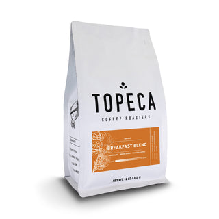 Topeca Breakfast Blend coffee bag with bold TOPECA logo and orange label