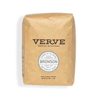 Bronson Verve whole bean coffee bag in brown paper with round Bronson label announcing our darkest roast.