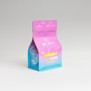 Honduras Angel Antonio Rivera washed Parainema coffee bag in pink against a colorful illustrated backdrop.