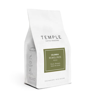 Temple Coffee Roasters Colombia Remolinos bag angled to reveal a green label with Colombia Remolinos details