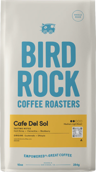 Cafe Del Sol coffee bag by Bird Rock Coffee Roasters with bold blue logo and yellow tasting notes panel