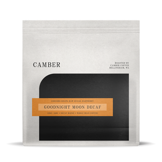 Goodnight Moon Decaf coffee bag with light gray packaging and orange decaf label
