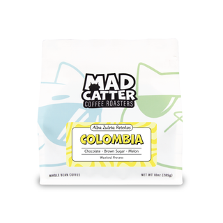 Coffee bag displaying Alba Zuleta Colombia origin label with Colombia tag and Antioquia region hint
