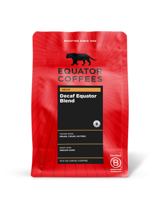 Red Equator Coffees Decaf Equator Blend bag with black label and gold accents.