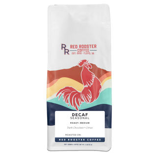 White Red Rooster Coffee bag with a colorful rooster illustration and Decaf branding