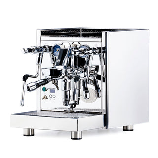 Chrome ECM Technika VI dual boiler espresso machine with dual group heads and blue gauge dials