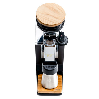 Top view of Eureka Oro Mignon Single Dose Pro coffee grinder with a wooden lid and glossy chrome body.