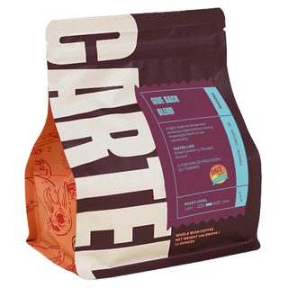 Give Back Blend coffee bag with a purple label and teal accent panels