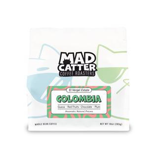 Guava Banana Colombia coffee label on a white bag with a green Colombia banner and anaerobic natural process notes.