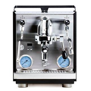 Front view of Profitec RIDE with two blue gauge dials, chrome group heads, and dual boiler setup.