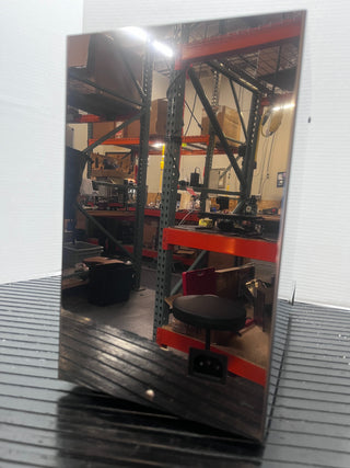 Warehouse storage area with tall metal racks, orange beams, and boxes creating an industrial scene