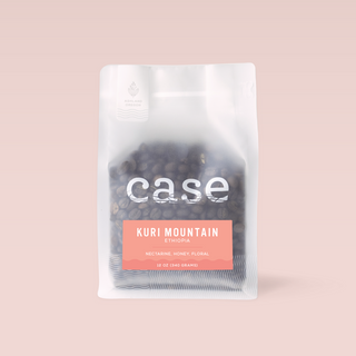 Ethiopia Kuri Mountain coffee bag from Case Coffee Roasters on a soft pink background