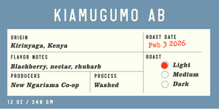 Kenya Kiamugumo AB coffee bag shown from the side with Quills Coffee branding and blue label panel