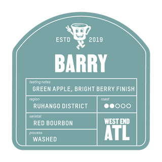 Close-up of the Barry coffee bag label on the orange bag showing tasting notes and origin with a teal badge.