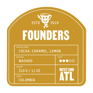 Founders coffee bag label on orange package with chocolate pieces and lemon halves around