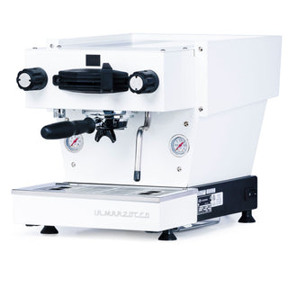 Front view of a white La Marzocco Linea Mini espresso machine with a hanging portafilter and dual gauges