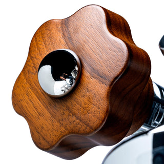 Close up of a walnut wood knob from the Lelit Walnut Upgrade Kit