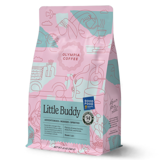 Little Buddy coffee bag from Olympia Coffee Roasting Company with colorful pink and teal artwork and award badges
