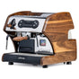 Front view of a certified pre owned LUCCA A53 Mini Walnut espresso machine with walnut wood casing and control panel.