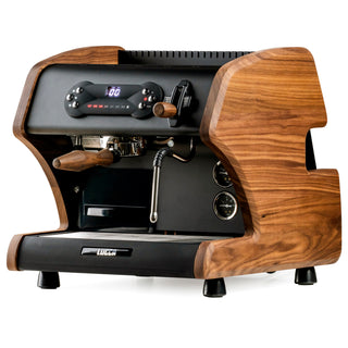 Close up of LUCCA A53 Pro espresso machine interior with wooden exterior, digital display, and steam wand.