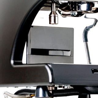 Close up of LUCCA A53 Pro Direct Plumb Kit with water supply quick connect and drain hose under the machine.