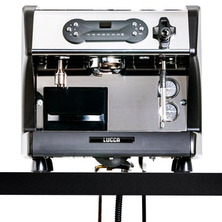 Interior view of LUCCA A53 Pro Direct Plumb Kit installed, with the machine front panel and right side pressure gauges visible.