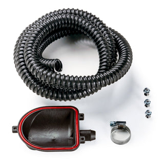 Coiled black spiral hose with red edged mounting end and assorted clamps and fittings for drip tray kit
