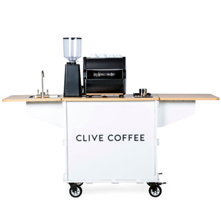 Front view of KlassyKarts coffee cart with espresso setup and CLIVE COFFEE branding on the base