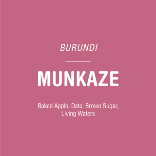 Burundi Munkaze coffee label on pink backdrop listing flavor notes baked apple date brown sugar living waters