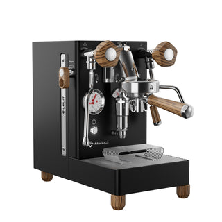 Angled front view of MaraX3 espresso machine with wood wrapped handles and polished chrome finish.