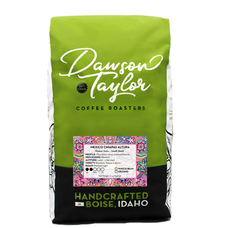 Bright green Dawson Taylor Coffee Roasters bag with white script logo and black bottom standing upright.